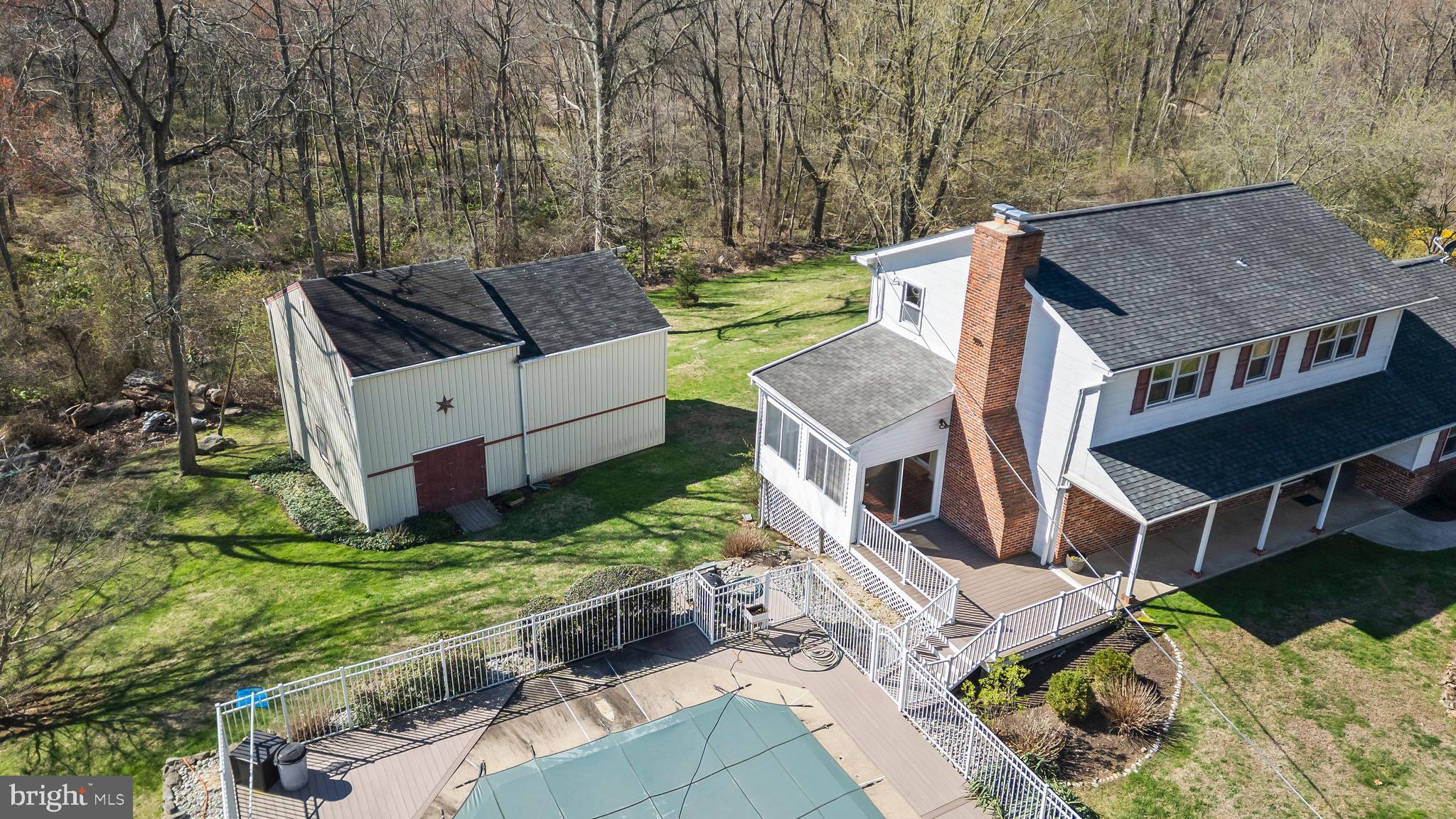 982 Fairview Road Glenmoore, PA 19343 - Photo 51 of 74 an aerial view of a house with a yard