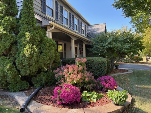 1528 Sequoia Road Naperville, IL 60540 - Photo 1 of 34 a view of a house with a yard and garden