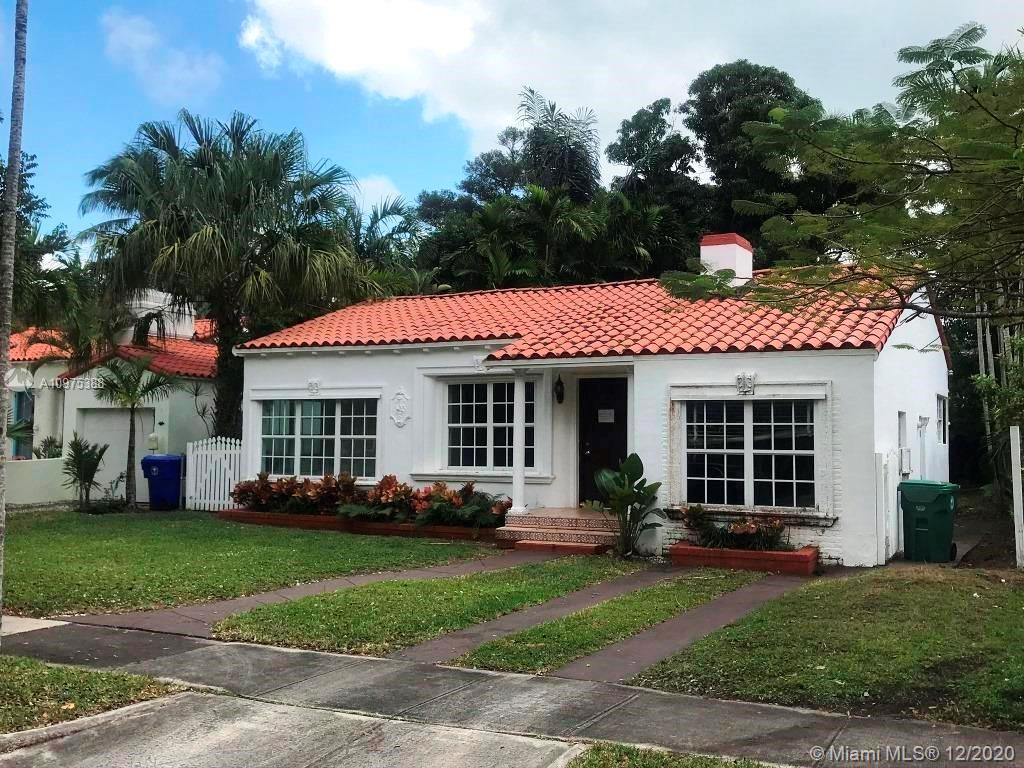 770 Northeast 77th Street Miami, FL 33138 - Photo 2 of 20 a front view of a house with a garden and plants