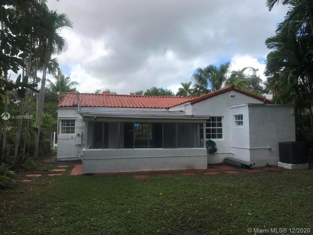 770 Northeast 77th Street Miami, FL 33138 - Photo 3 of 20 a view of a house with a garden