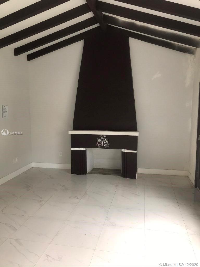 770 Northeast 77th Street Miami, FL 33138 - Photo 4 of 20 a view of an empty room