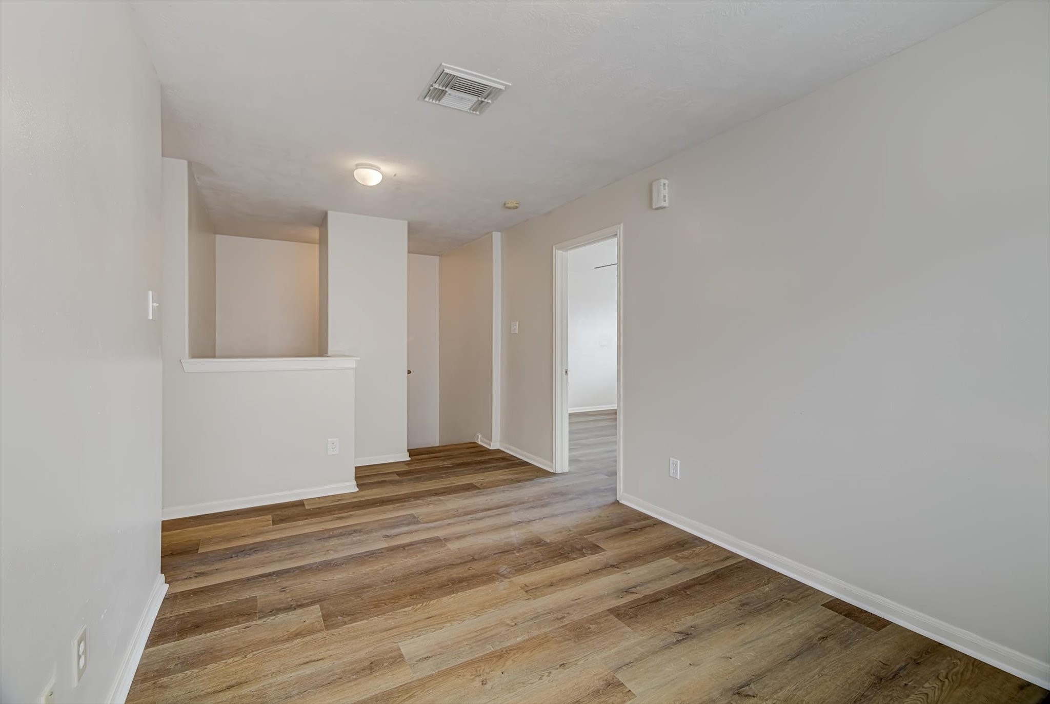 13983 Maximos Drive Houston, TX 77083 - Photo 17 of 34 a view of an empty room