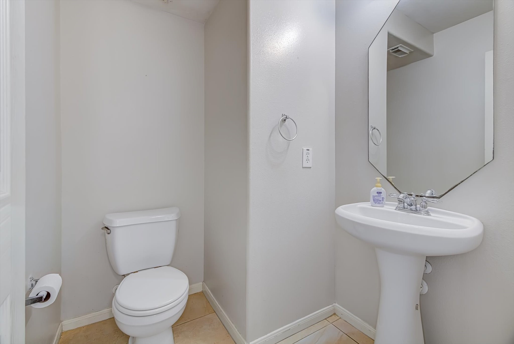 13983 Maximos Drive Houston, TX 77083 - Photo 31 of 34 a bathroom with a sink toilet and a mirror