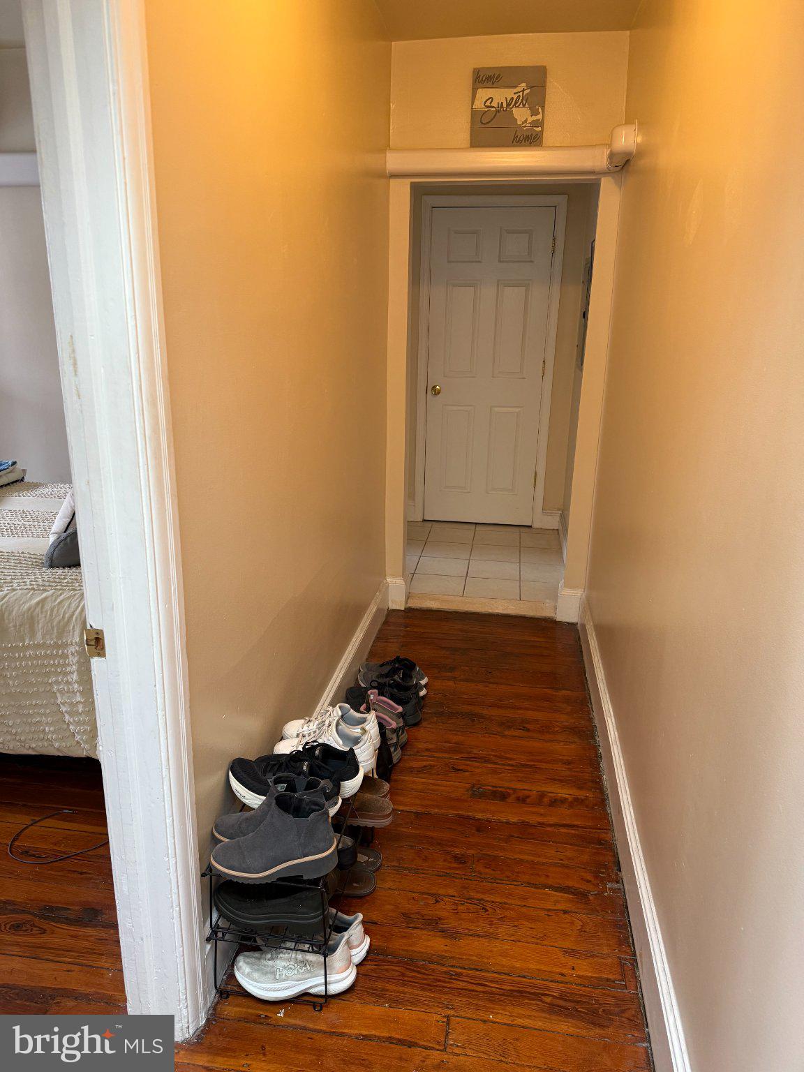 1723 Pine Street, Unit 4 Philadelphia, PA 19103 - Photo 11 of 16 Welcoming hallway with warm tones.