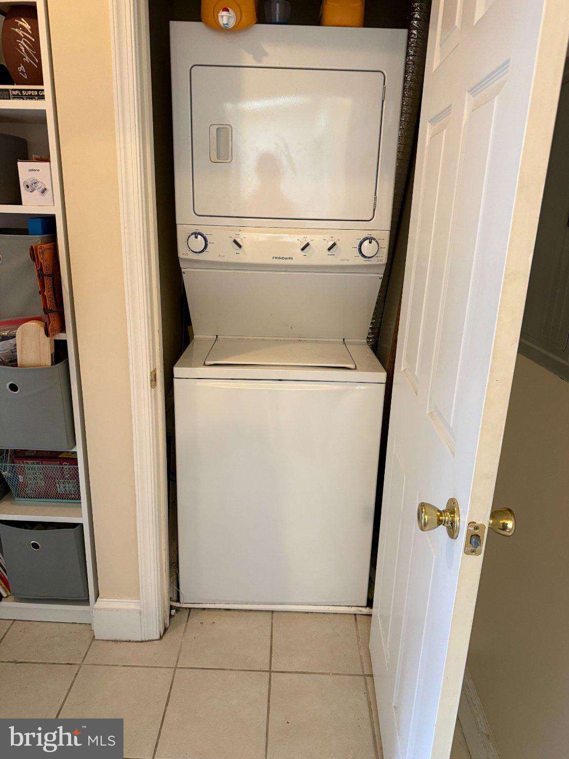 1723 Pine Street, Unit 4 Philadelphia, PA 19103 - Photo 12 of 16 Compact laundry setup in a cozy nook.