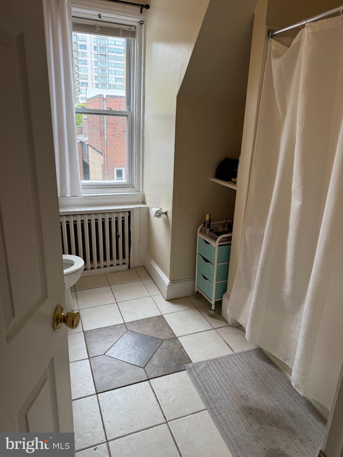 1723 Pine Street, Unit 4 Philadelphia, PA 19103 - Photo 14 of 16 Bright and airy bathroom retreat.