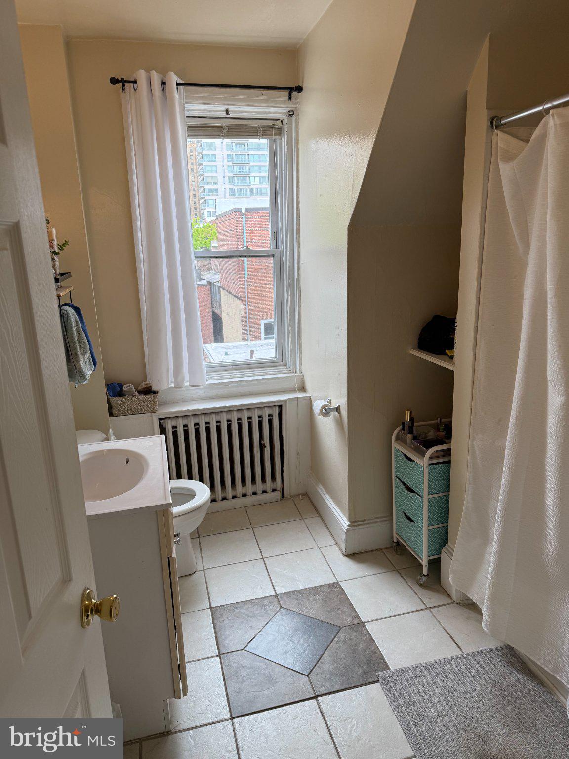 1723 Pine Street, Unit 4 Philadelphia, PA 19103 - Photo 16 of 16 Bright and airy urban bathroom retreat.