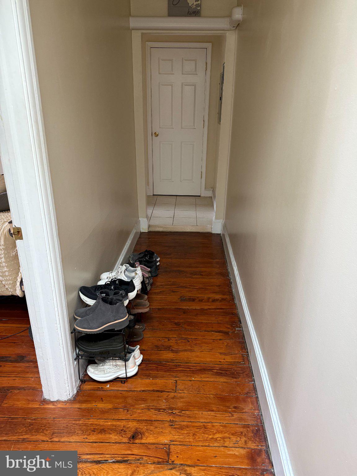 1723 Pine Street, Unit 4 Philadelphia, PA 19103 - Photo 7 of 16 Inviting hallway with warm wood tones.