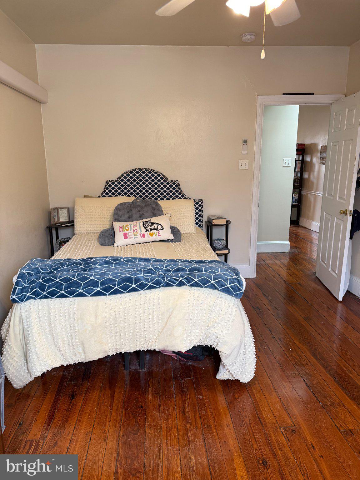 1723 Pine Street, Unit 4 Philadelphia, PA 19103 - Photo 10 of 16 Cozy bedroom with warm wooden floors.
