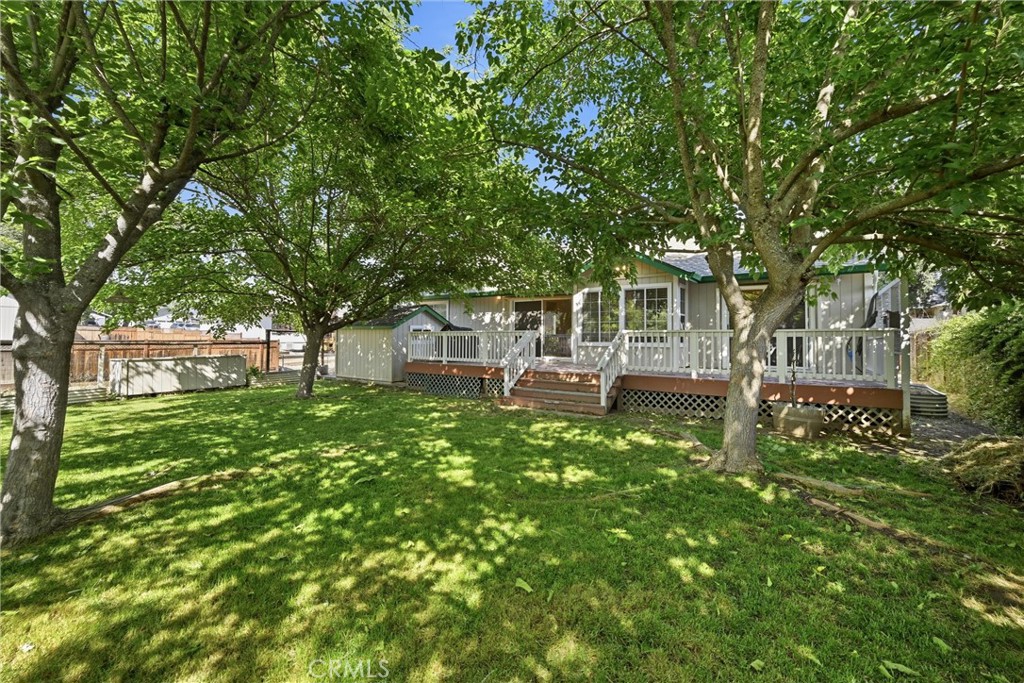 18846 Horseshoe Road Hidden Valley Lake, CA 95467 - Photo 22 of 31 a front view of a house with a yard