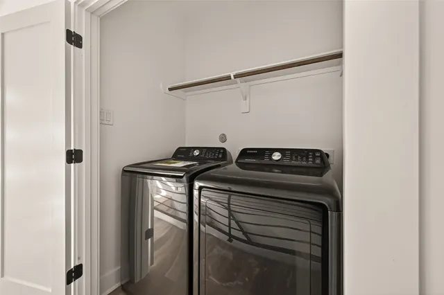 a kitchen with a stove and a refrigerator