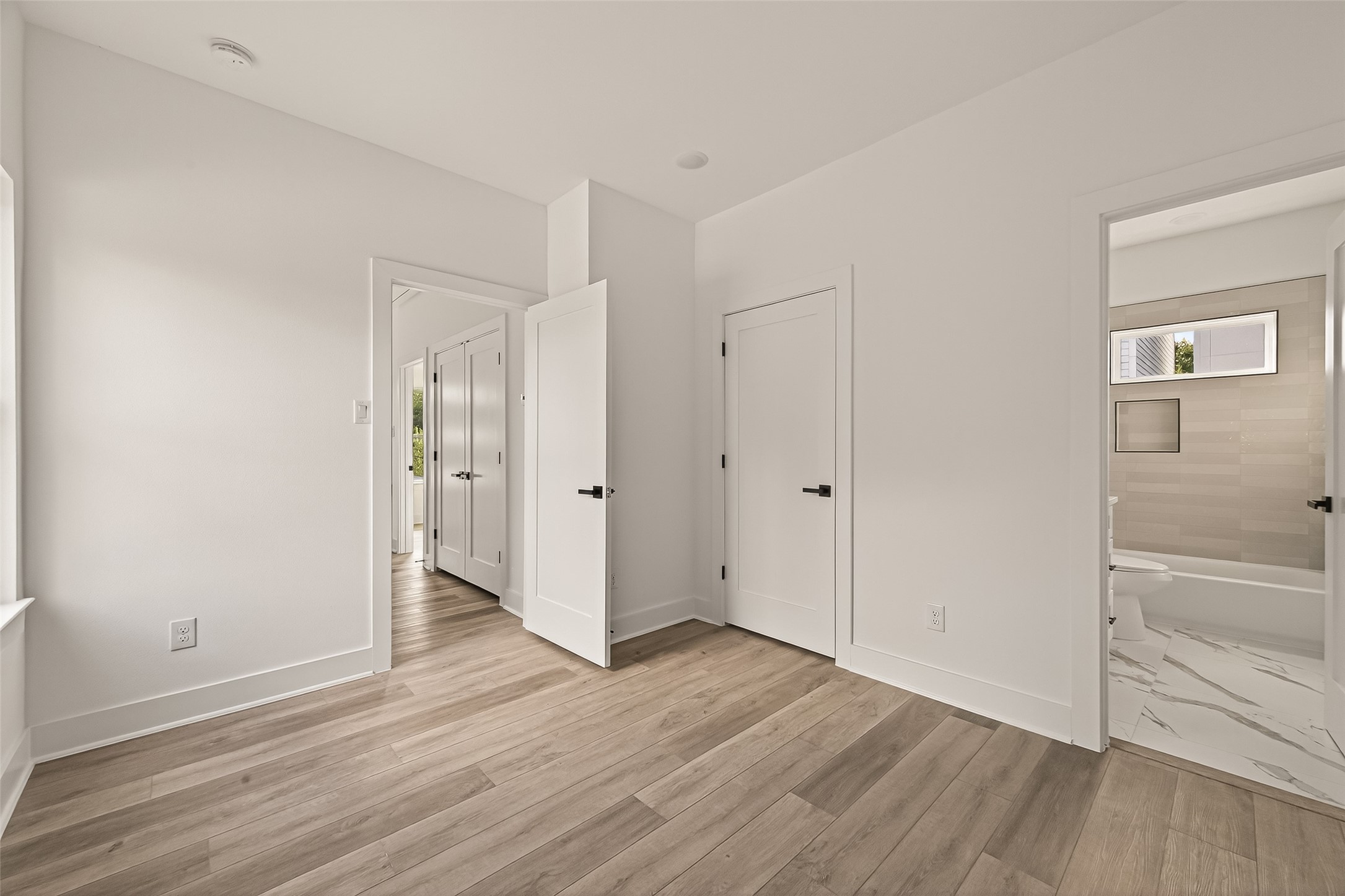 2475 Carmel Street, Unit B Houston, TX 77091 - Photo 14 of 21 Secondary bedroom with its own private bath - ideal for guests and roommates.