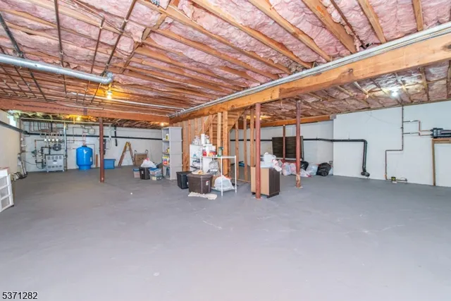 a view of a garage with white walls
