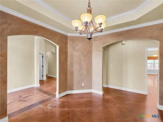 a view of a chandelier in a room