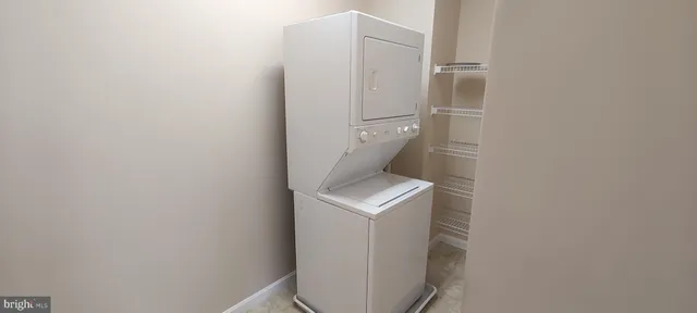 a room with furniture and window