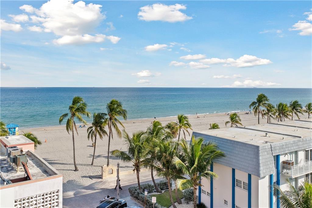 320 South Surf Road, Unit 601 Hollywood, FL 33019 - Photo 15 of 19 a view of a palm tree from a balcony