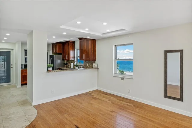 a view of kitchen and natural light