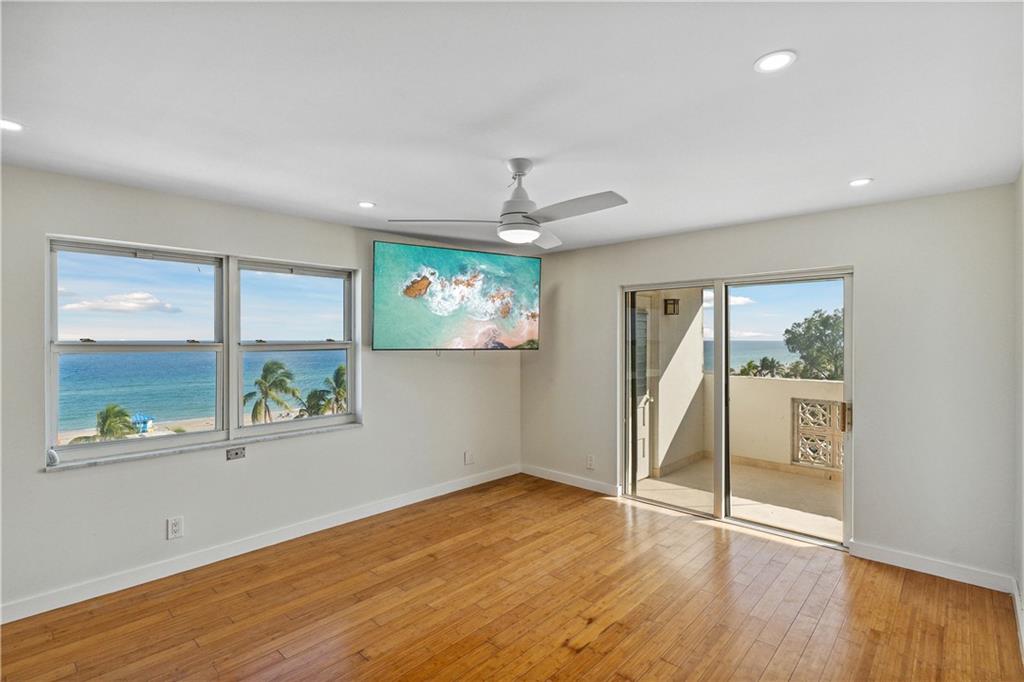 320 South Surf Road, Unit 601 Hollywood, FL 33019 - Photo 3 of 19 wooden floor in an empty room with a window