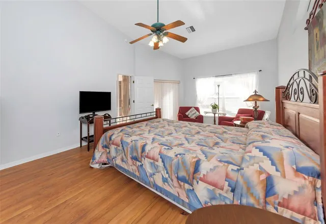 an aerial view of a houses with yard