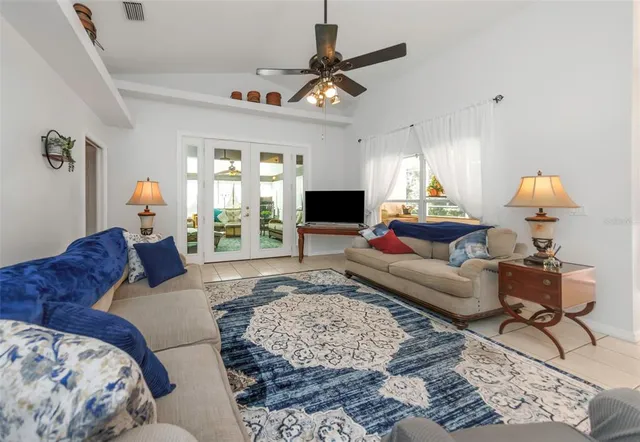 a kitchen with stainless steel appliances granite countertop a refrigerator sink and cabinets