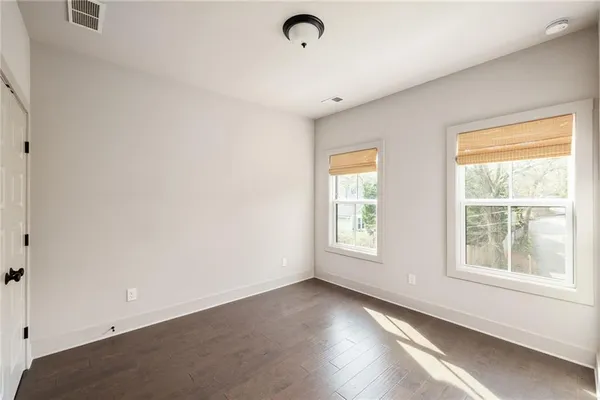 an empty room with windows