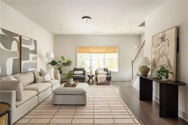 a living room with furniture and a couch