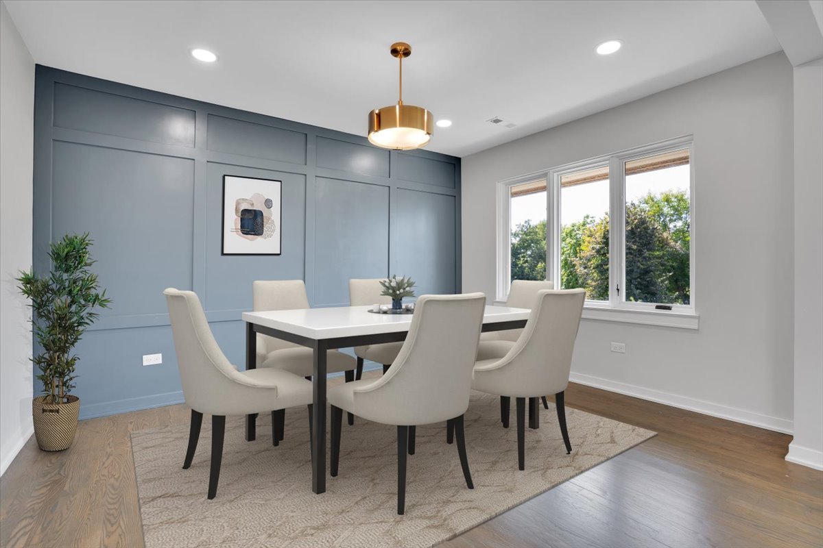 7330 Ogden Avenue, Unit 3 Riverside, IL 60546 - Photo 11 of 37 a view of a dining room with furniture window and wooden floor