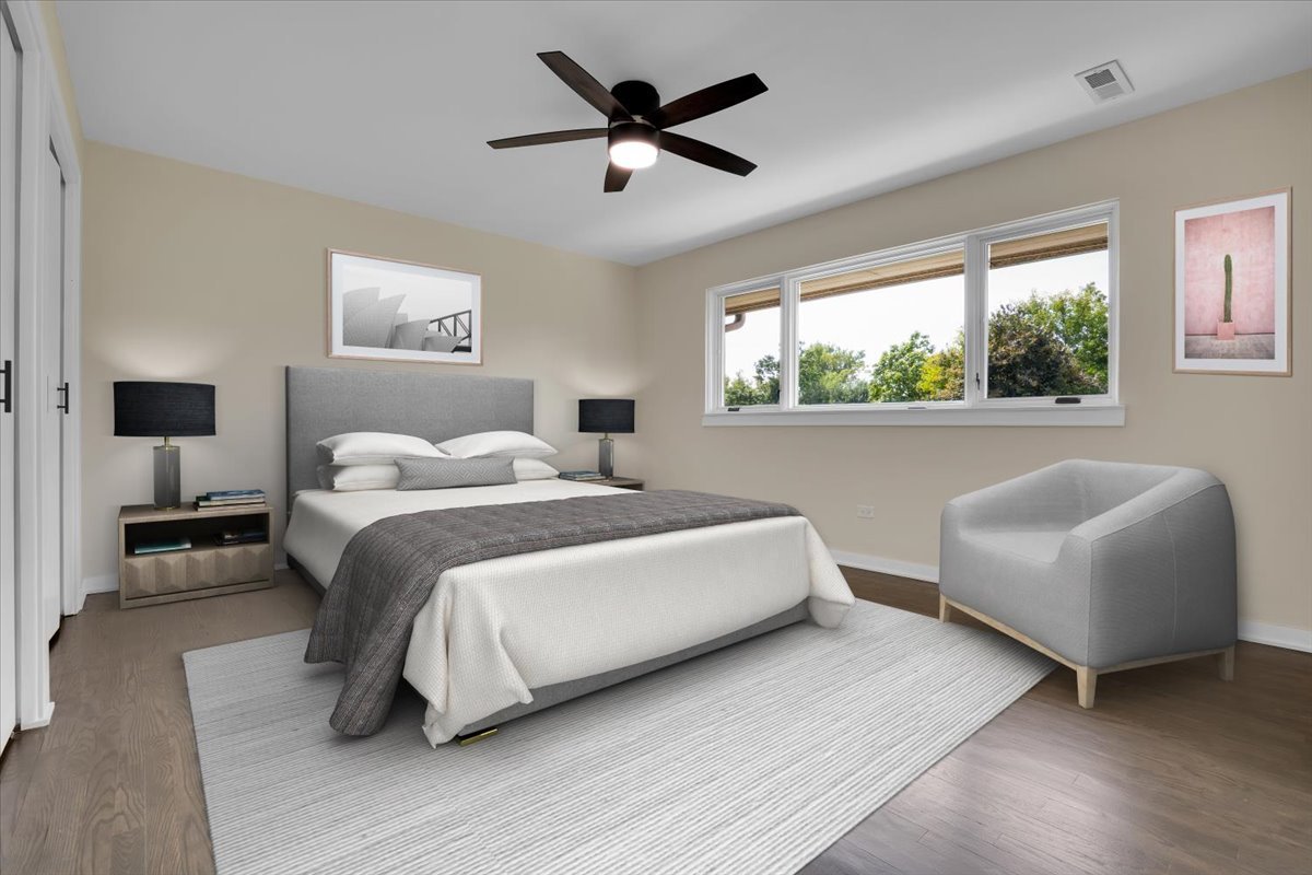 7330 Ogden Avenue, Unit 3 Riverside, IL 60546 - Photo 19 of 37 a bedroom with a bed and a couch