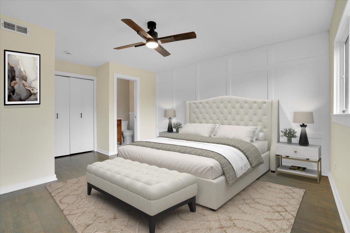 7330 Ogden Avenue, Unit 3 Riverside, IL 60546 - Photo 27 of 37 a bedroom with a bed and a chandelier