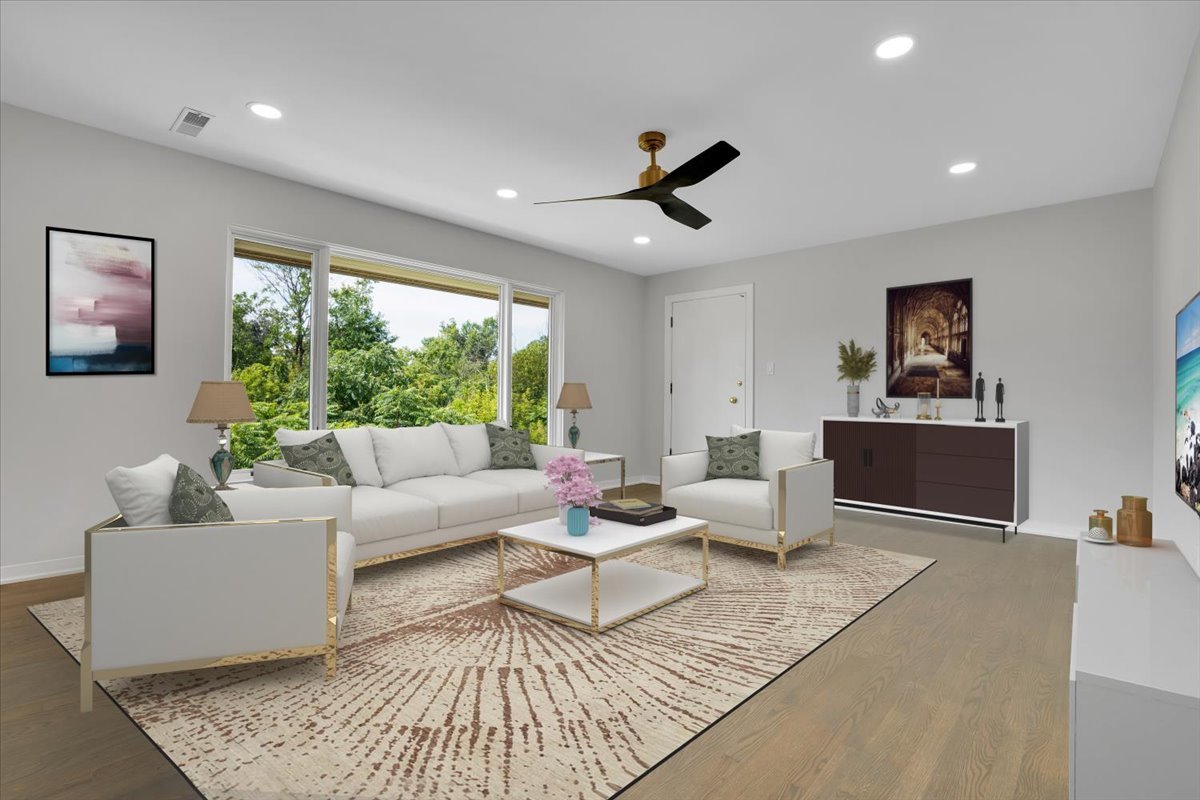 7330 Ogden Avenue, Unit 3 Riverside, IL 60546 - Photo 8 of 37 a living room with furniture and a large window
