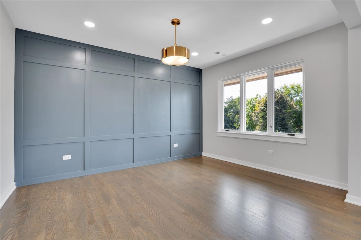 7330 Ogden Avenue, Unit 3 Riverside, IL 60546 - Photo 10 of 37 a view of an empty room with a window