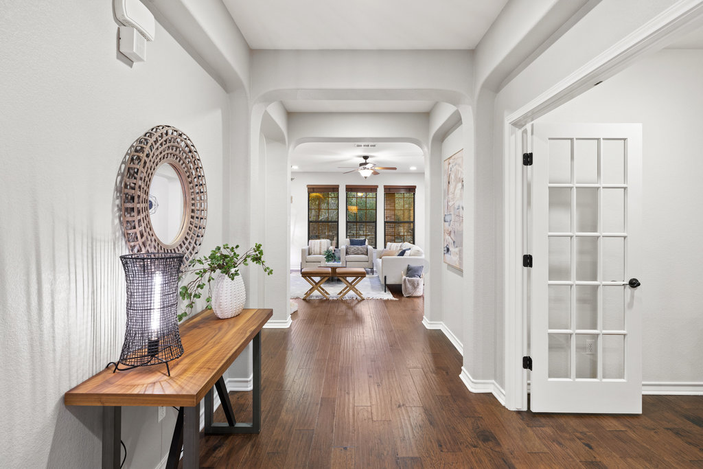 11217 Bastogne Loop Austin, TX 78739 - Photo 17 of 40 a living room with furniture and wooden floor