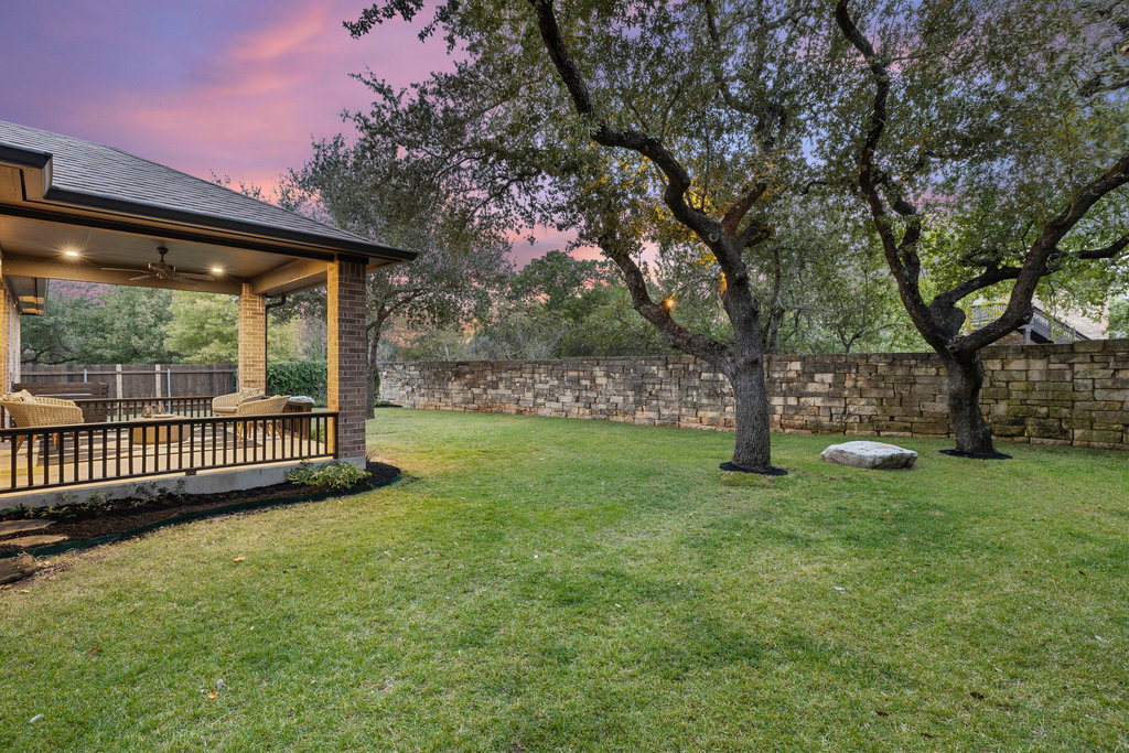 11217 Bastogne Loop Austin, TX 78739 - Photo 31 of 40 a view of a yard with a large tree