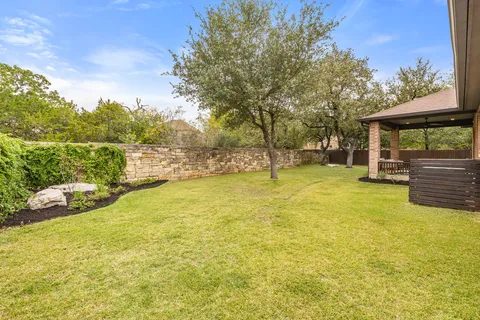 a view of a swimming pool with an outdoor space and seating area