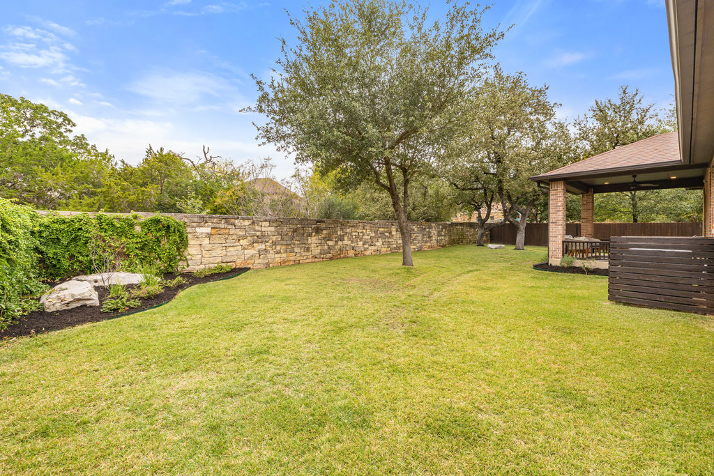 11217 Bastogne Loop Austin, TX 78739 - Photo 34 of 40 a view of a swimming pool with an outdoor space and seating area