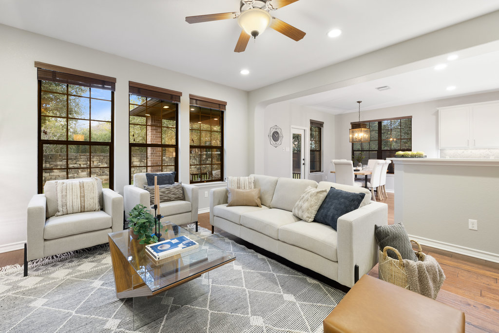 11217 Bastogne Loop Austin, TX 78739 - Photo 7 of 40 a living room with furniture and a large window