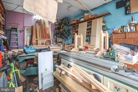a front view of a house with large windows