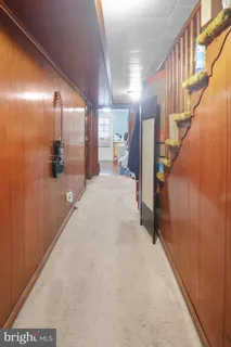 a view of a hallway with entryway