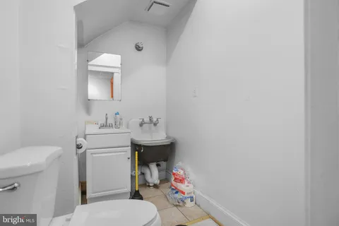 a view of a livingroom with furniture and window