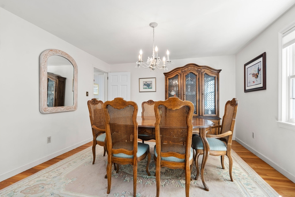40 Amble Road Chelmsford, MA 01824 - Photo 11 of 26 a view of a dining room with furniture and chandelier