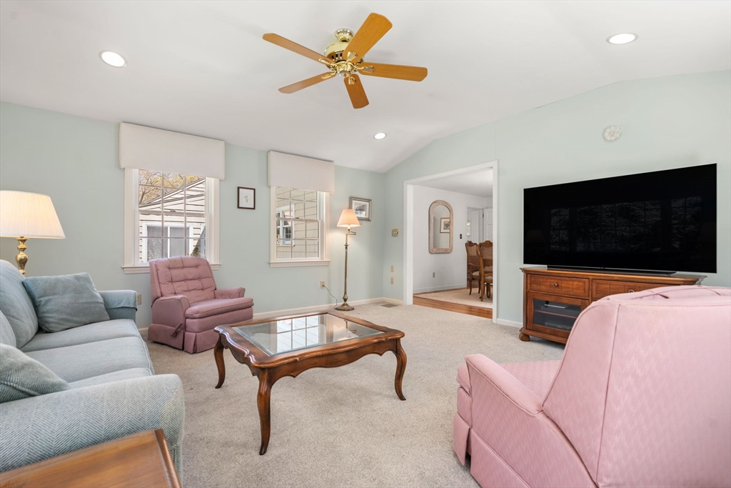 40 Amble Road Chelmsford, MA 01824 - Photo 13 of 26 a living room with furniture and a flat screen tv
