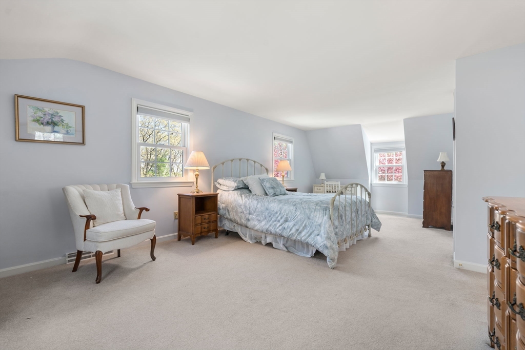 40 Amble Road Chelmsford, MA 01824 - Photo 15 of 26 a bedroom with a bed and a couch