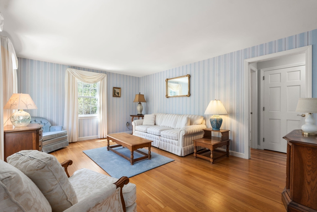 40 Amble Road Chelmsford, MA 01824 - Photo 2 of 26 a living room with furniture and wooden floor