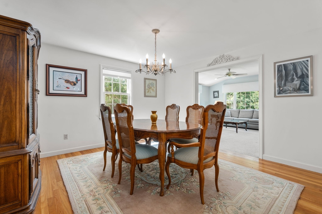 40 Amble Road Chelmsford, MA 01824 - Photo 10 of 26 a view of a dining room with furniture window and wooden floor