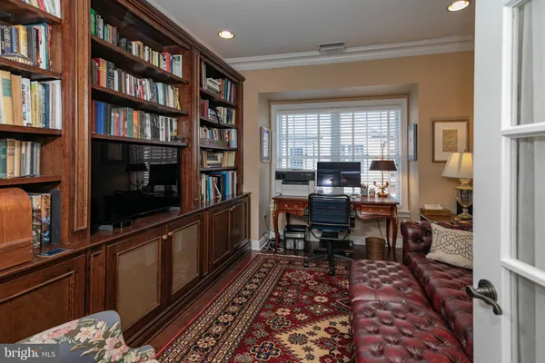 a view of a workspace with furniture