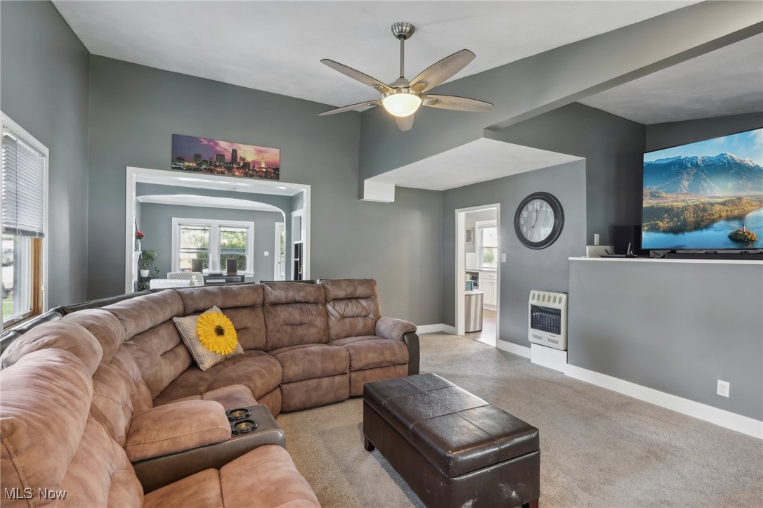 1567 Roselawn Road Cleveland, OH 44124 - Photo 13 of 29 Carpeted living room with ceiling fan