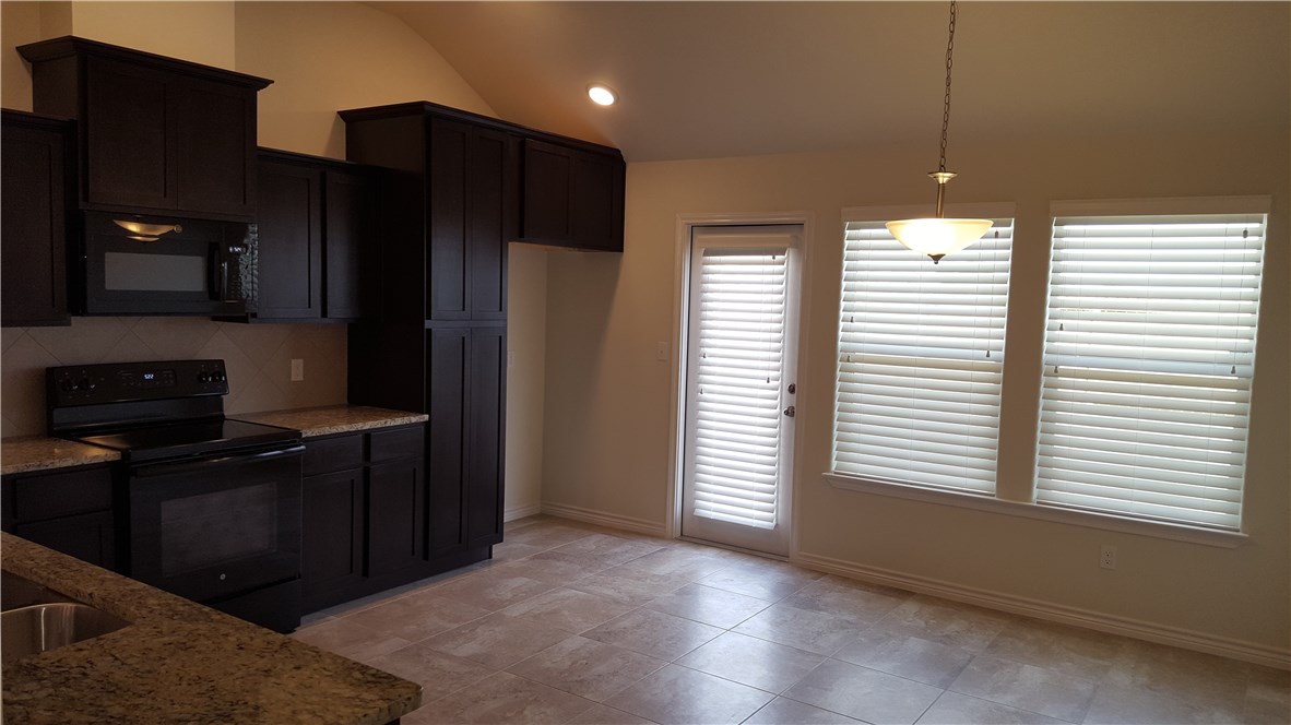 7518 Ranch View Drive Corpus Christi, TX 78414 - Photo 4 of 15 Nice black refrigerator has been added since this