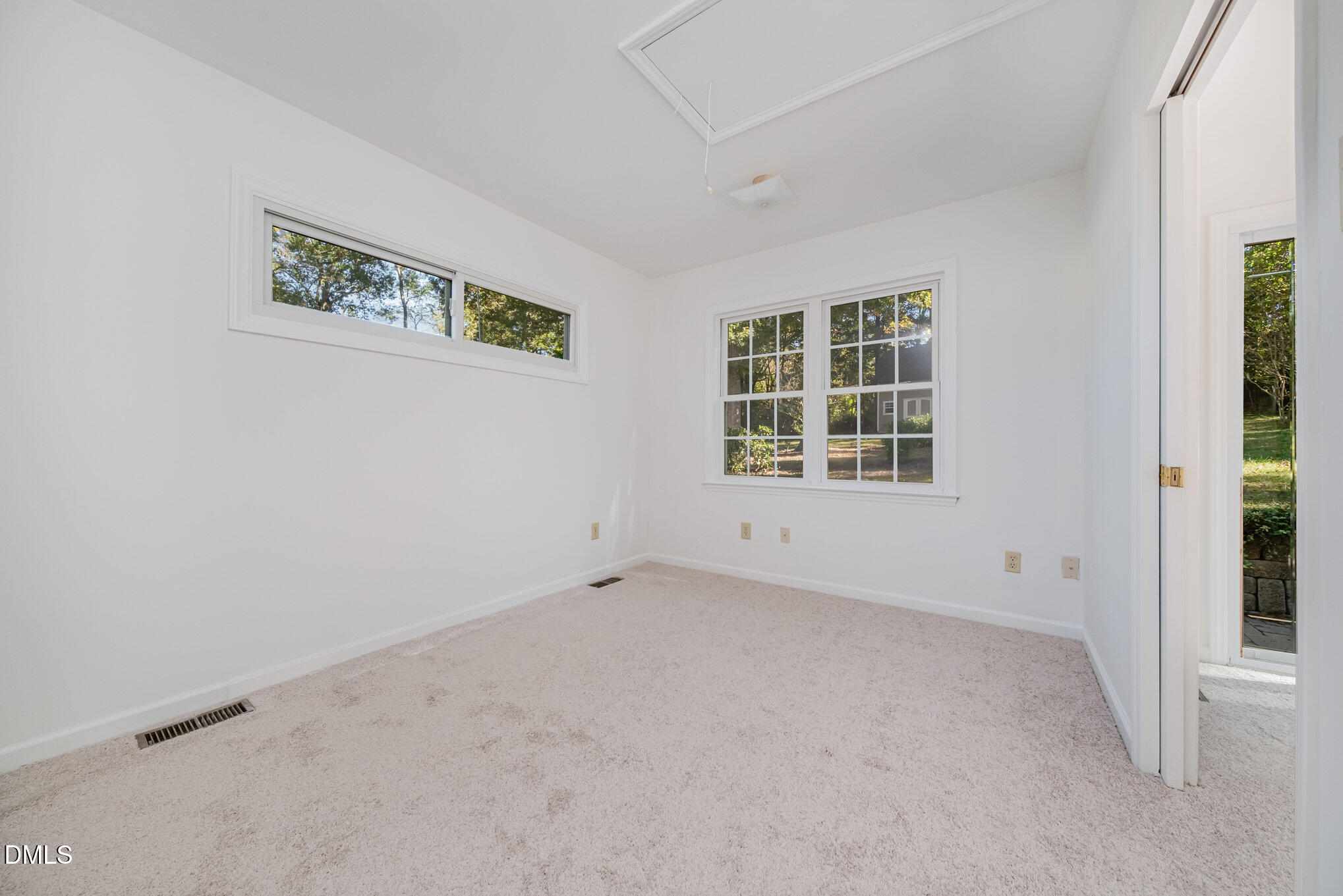 13018 Meadow Ridge Drive Rougemont, NC 27572 - Photo 13 of 26 an empty room with windows