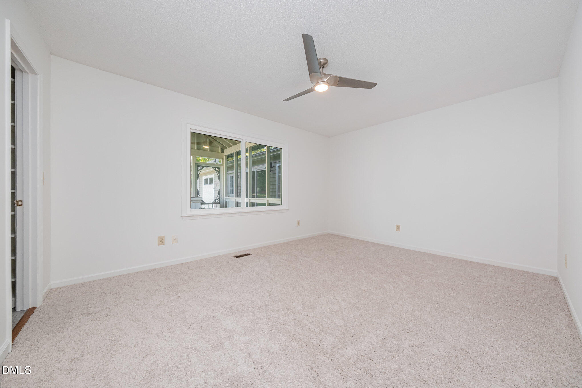 13018 Meadow Ridge Drive Rougemont, NC 27572 - Photo 21 of 26 an empty room with a window