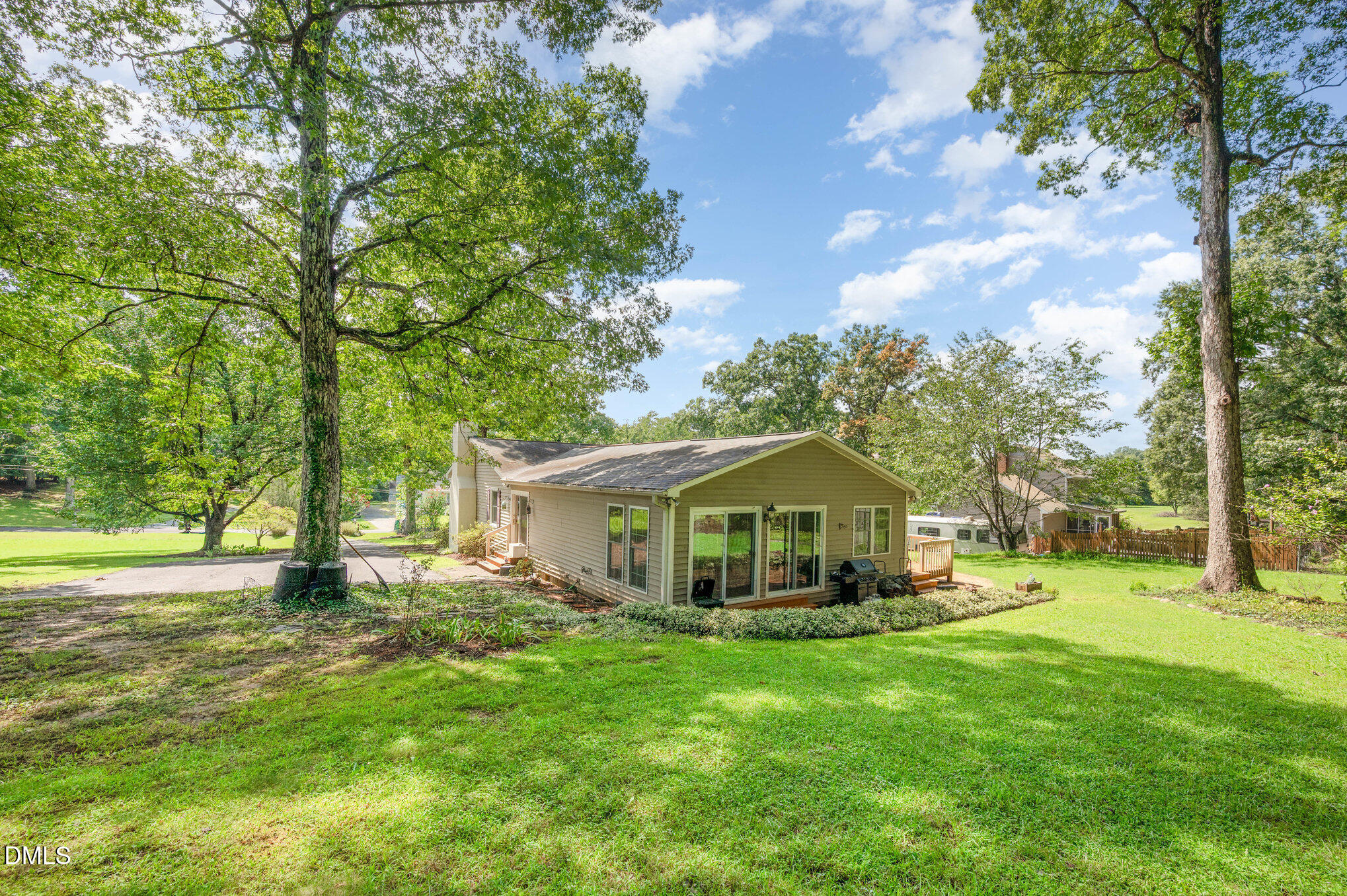 13018 Meadow Ridge Drive Rougemont, NC 27572 - Photo 22 of 26 a front view of a house with garden